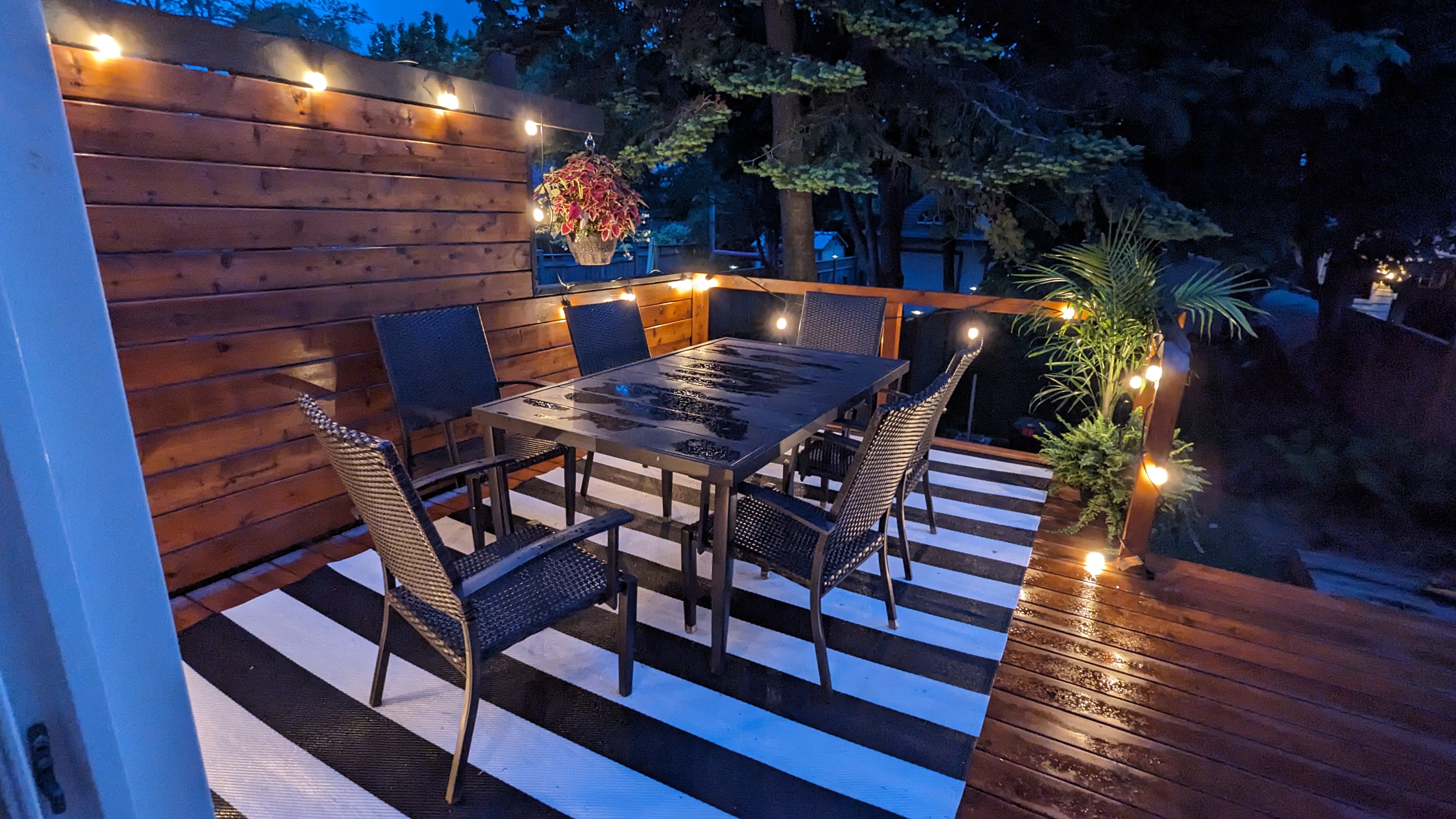 Freshly built wooden backyard deck with cedar boards